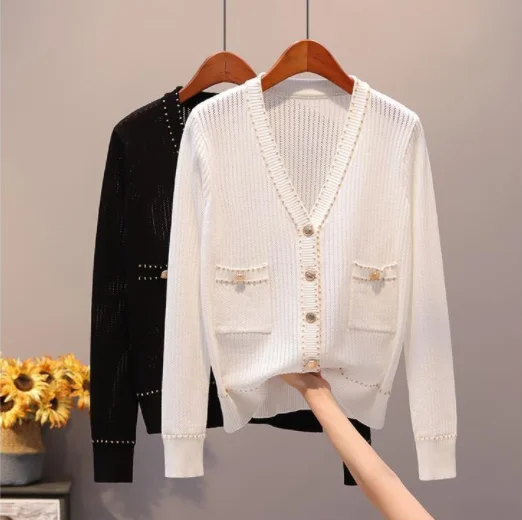 

Small fragrance white v-neck knitted cardigan women's thin coat 2021 spring and autumn loose hollow short sweater tide