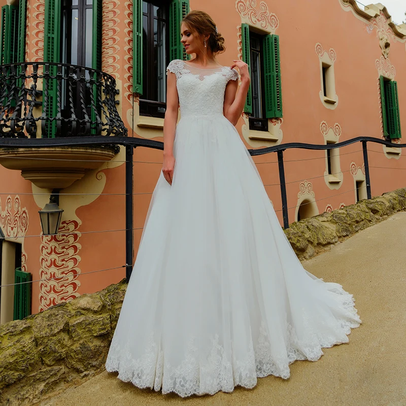 

Modest Tulle Backless Wedding Dresses 2021 Cap Sleeve Scoop Neck Sweep Train Lace Apllique A-line Bridal Gowns