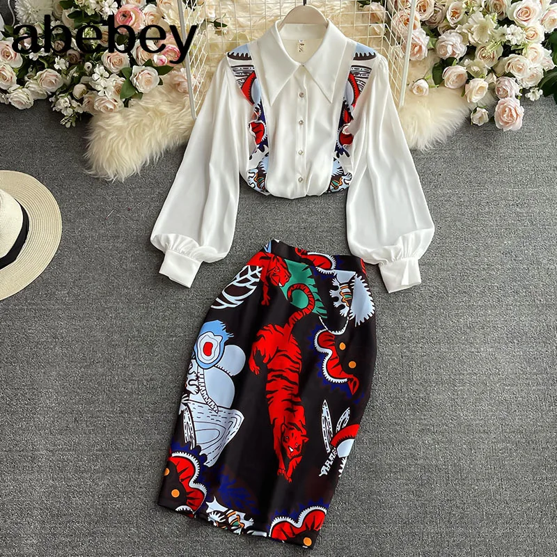 

2021 New Spring Autumn Korean turn down collar Lantern Sleeve print Shirt Top + high waist mid-length wrap Skirt two-piece set