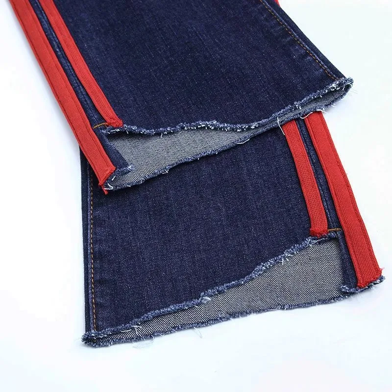 

Autumn and winter new European station street high waist was thin side stitching solid color jeans nine points denim flare pants