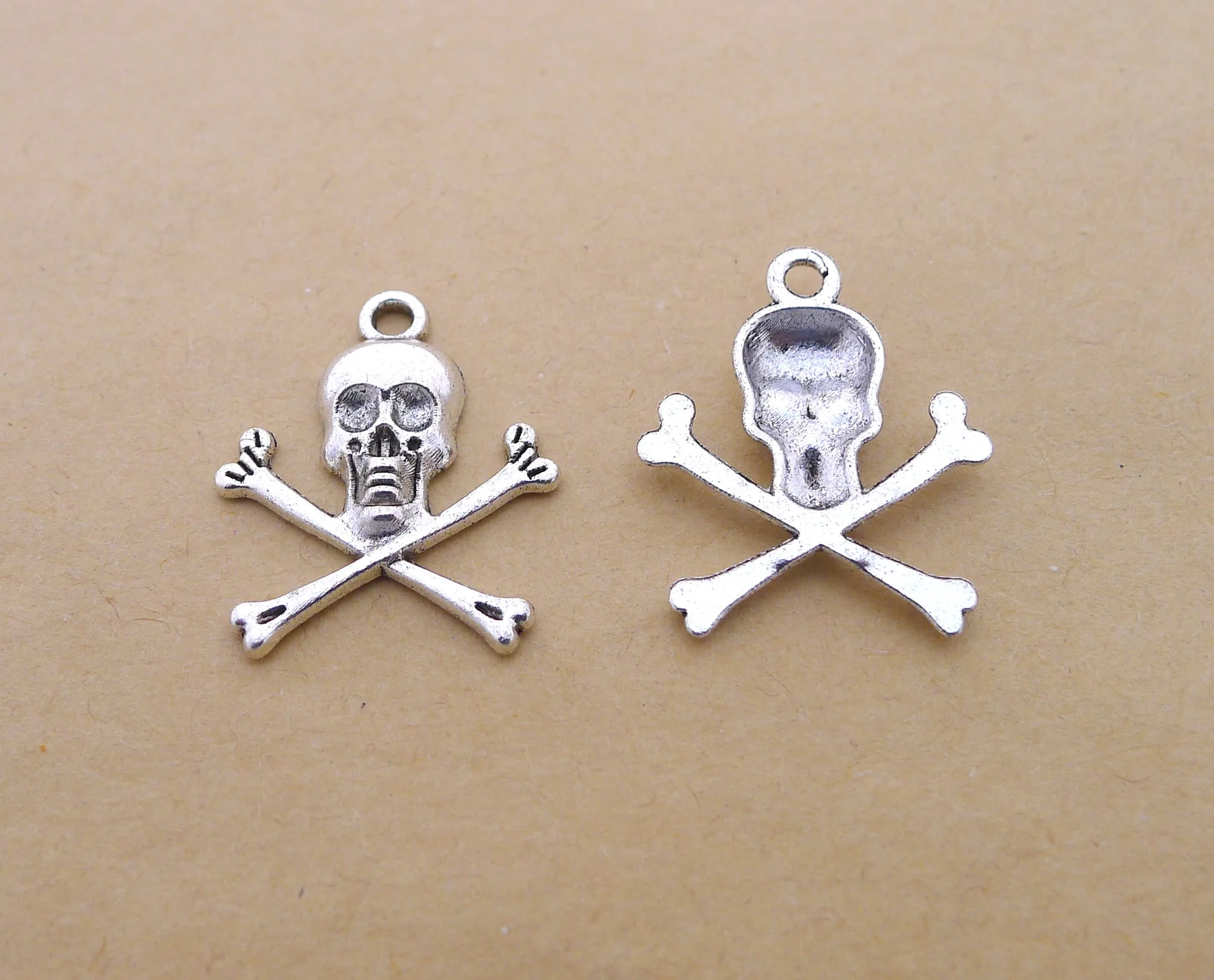 

Charm for making jewelry 10pcs 24x19mm antique silver color Skull charms