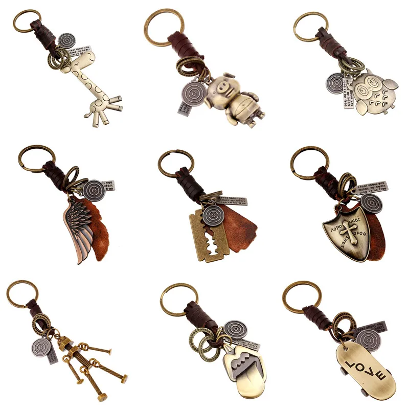 

KOtik 2022 New Genuine Leather KeyChain Punk Rock Vintage Animal Feather Robot Key Chains for Man Woman Jewelry Gifts