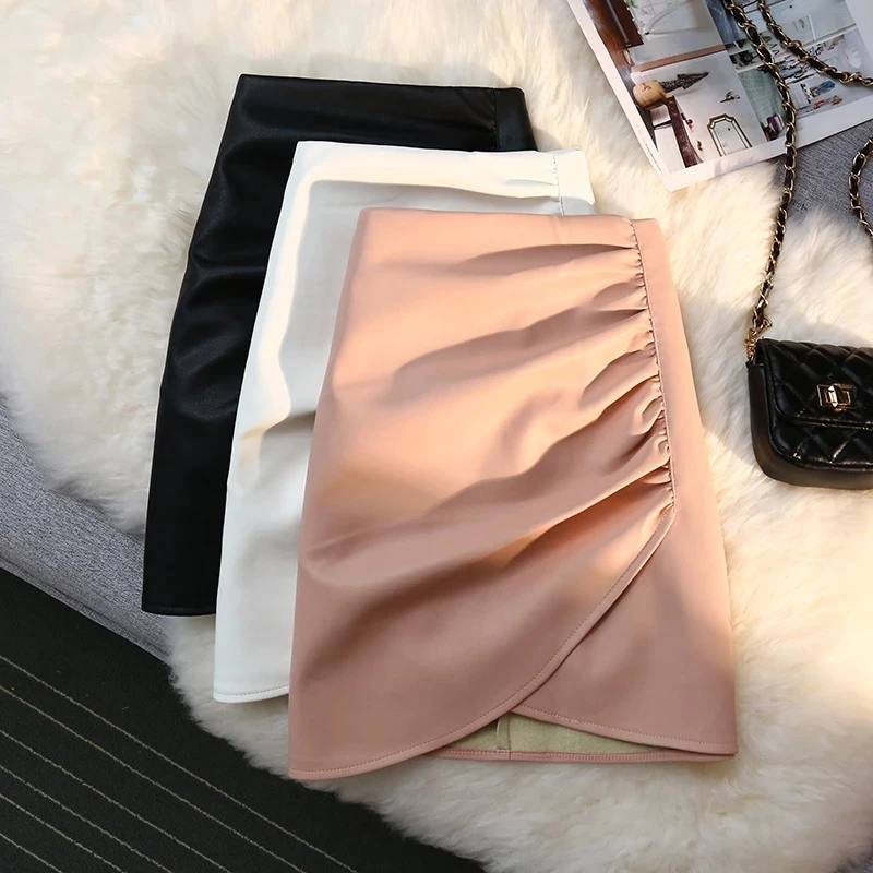 

Белая женская мини-юбка из искусственной кожи с завышенной талией, Весенняя облегающая Привлекательная юбка А-силуэта из искусственной кож...