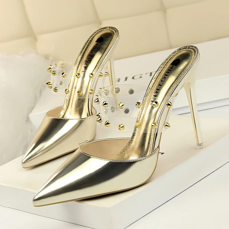 European and American style fashion female half-drag high-heeled shallow mouth hollow transparent word with metal rivet slippers | Обувь