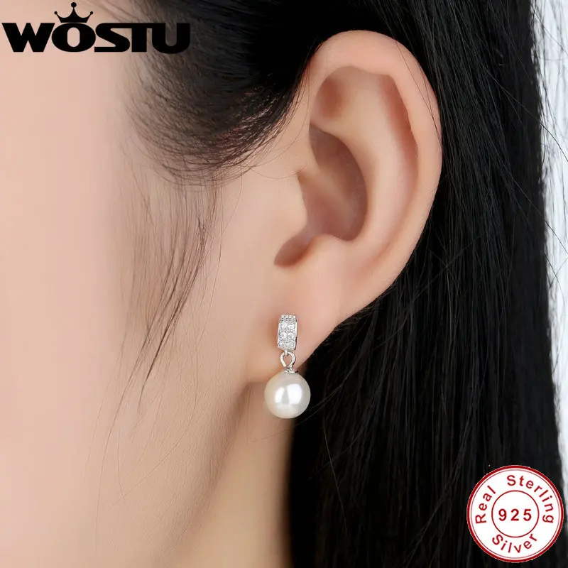 Женские серьги-подвески из серебра 100% пробы с прозрачным фианитом и жемчугом |