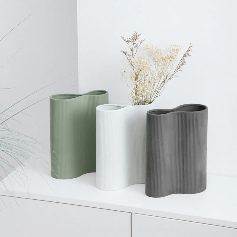 

Nordic simple special-shaped vase ceramic home decoration ceramic line flower insert decoration customization