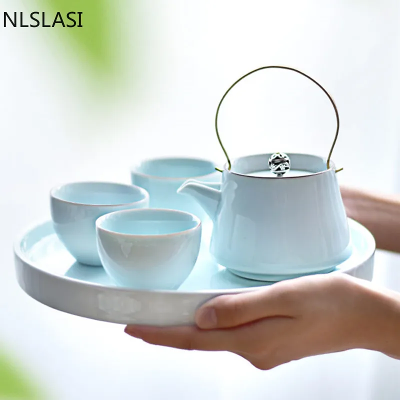

Китайские керамические чайные наборы, изысканный фарфоровый чайник из селадона, чайник ручной работы, чайные чашки, поднос для чая, Бытовая ...