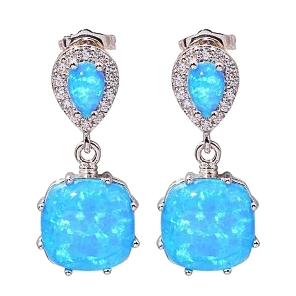 Женские серьги-гвоздики с подвеской в виде огненного опала | Украшения и