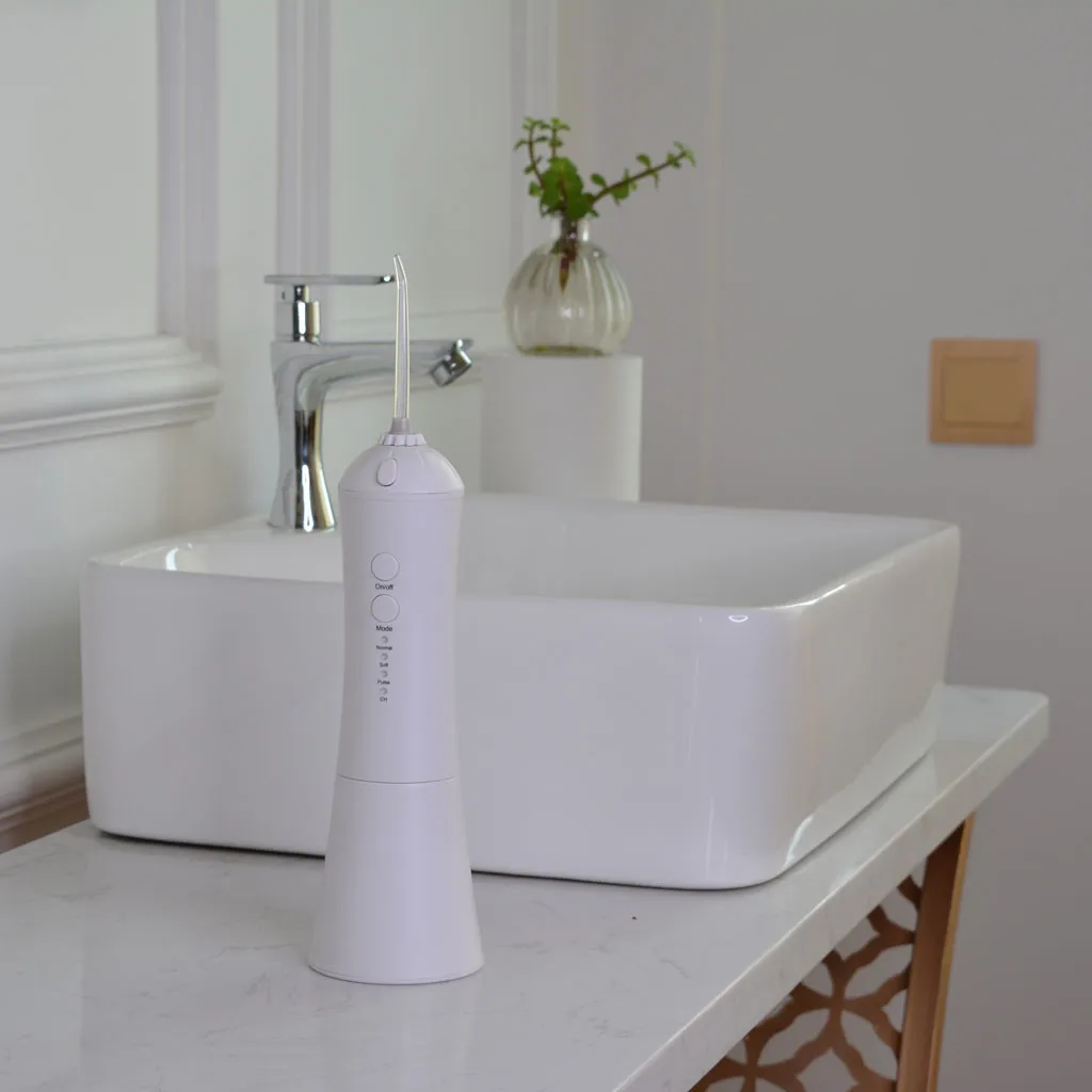 Электрическая машинка для чистки зубов с красными зубьями портативная машина