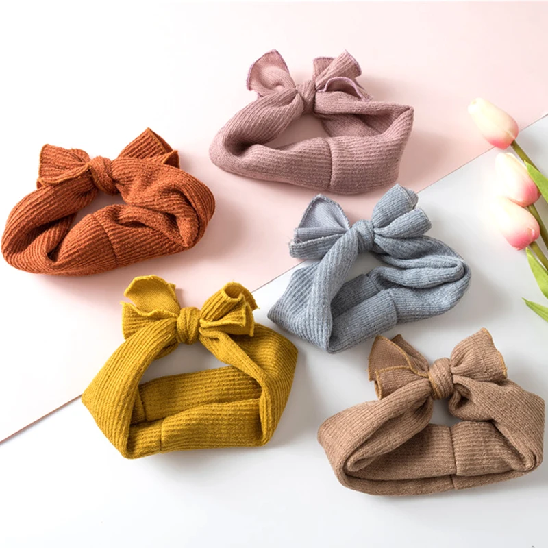 Детская вязаная повязка на голову с бантом зимняя теплая для девочек ушей