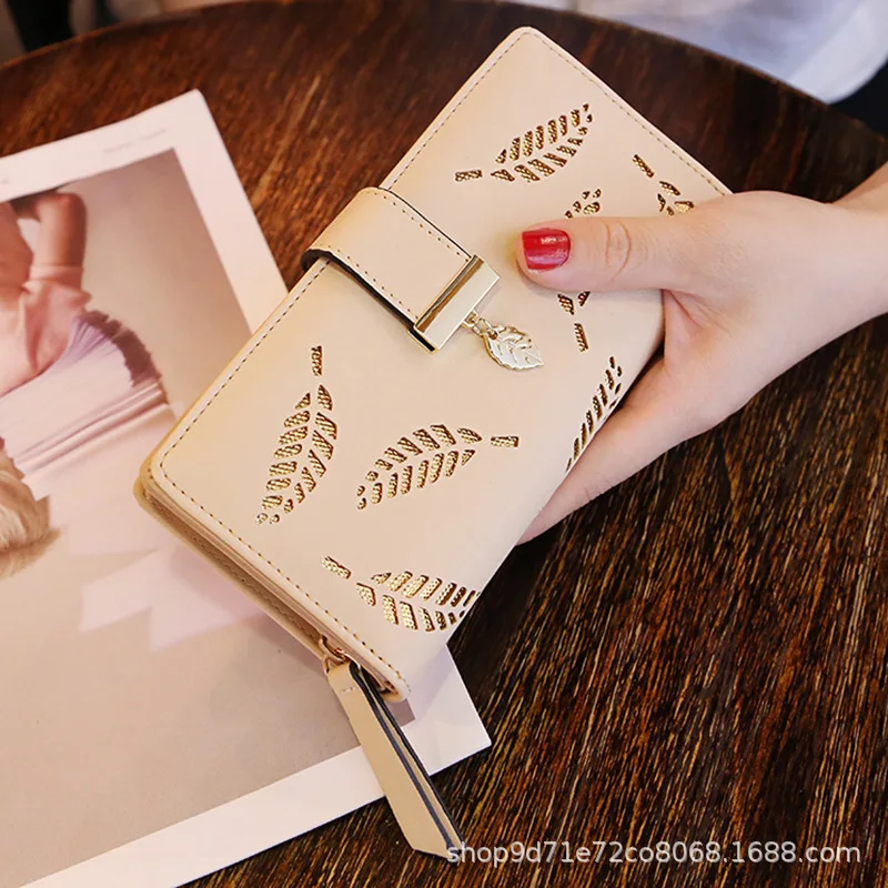 

2020 new lady clutch bag fashion hollow leaf long female wallet multi-card card bag mobile phone bag zipper buckle female bag