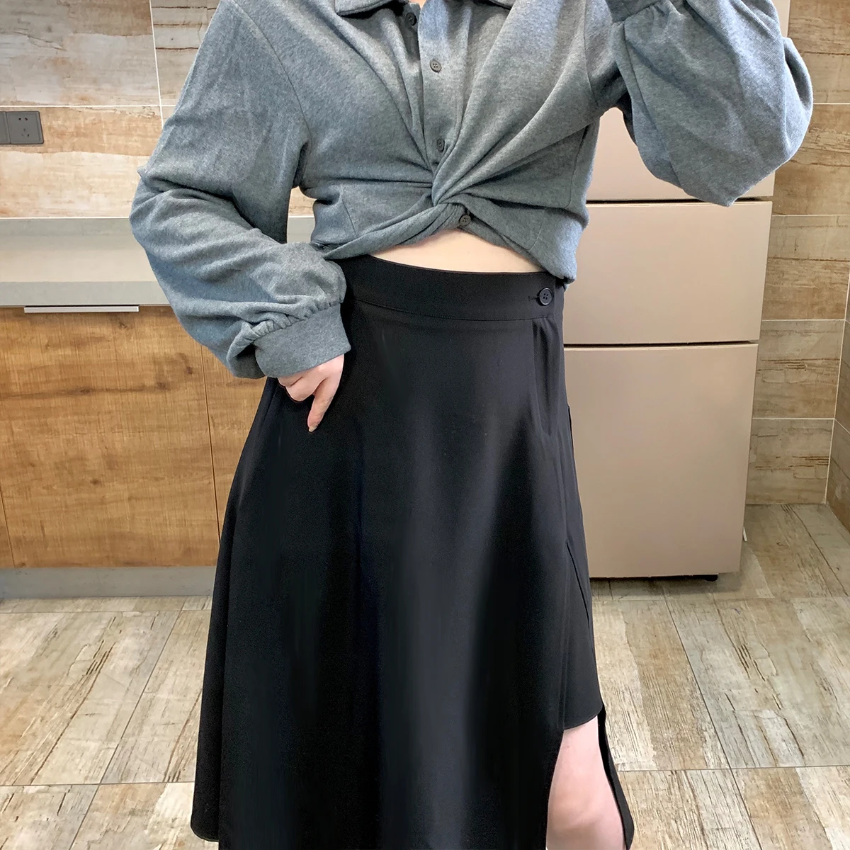 Женская Асимметричная юбка средней длины черная длинная трапециевидная с