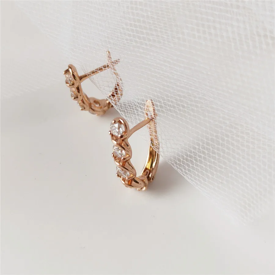 Серьги-гвоздики из розового золота 585 пробы с инкрустацией циркона праздничный