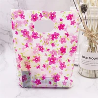 100pcslot wholesale blue flower plastic bag 1520cm shopping jewelry packaging plastic gift bag with handle