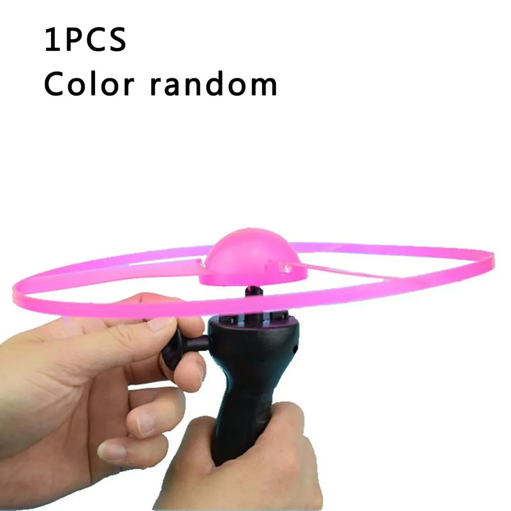 

1pc Funny Flying Hand-push Handle Pull Wire Flashing Plate Large Pull Wire Flying Saucer With Switch Random Color