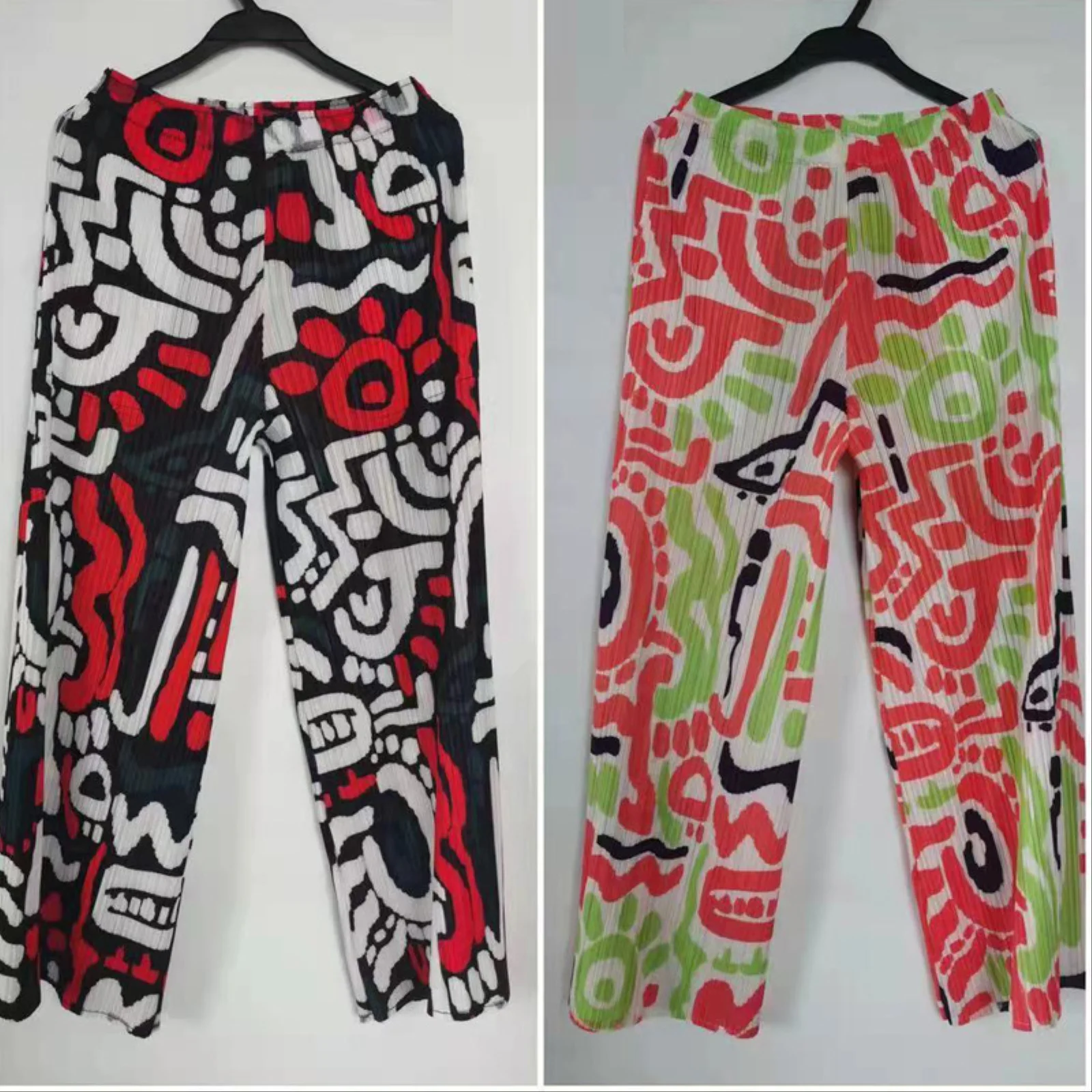 

Miyake Fold summer new style side slit large size loose and thin graffiti printing straight leg pants trousers women