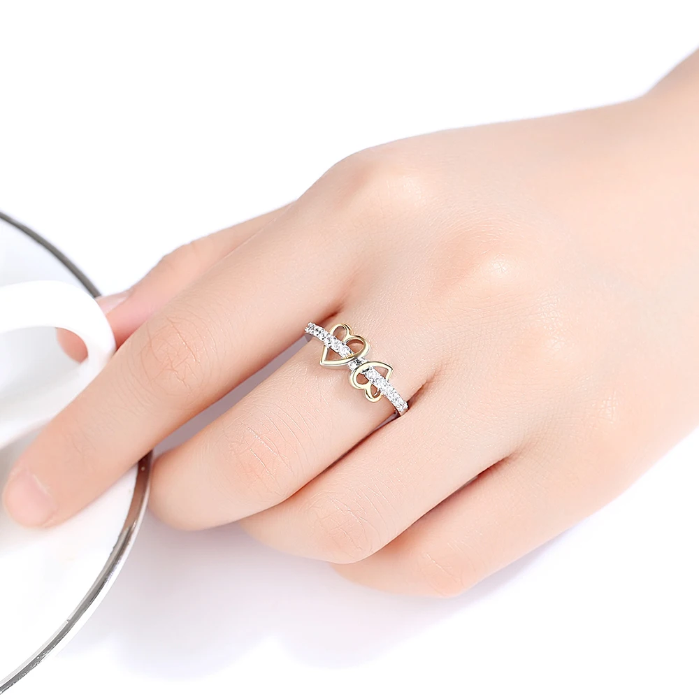 Женское кольцо с двойным сердцем и фианитом в классическом стиле | Украшения