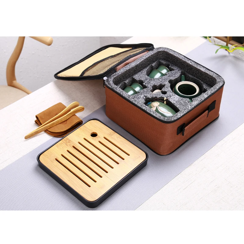 

Ceramic Teapot One Pot Four Cup Outdoor Travel Kung Fu Teapot Tote Bag Travel Cup Set Tcup Kung Fu Tea Set Chinese Tea Set Wine