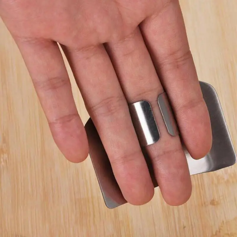 

Protector de dedos de acero inoxidable, herramienta de proteccin para dedos, cuchillos y accesorios de cocina, 1 Uds.