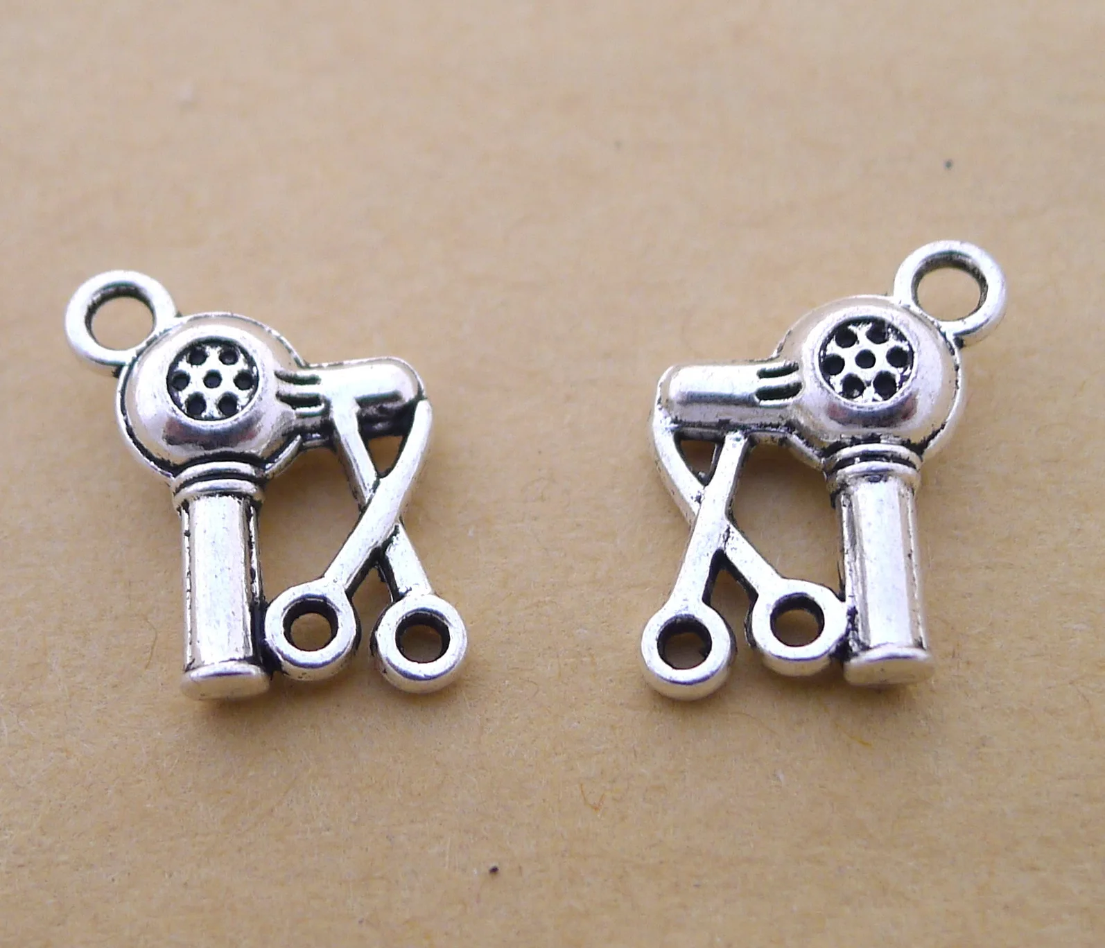 

Charm for making jewelry 10pcs 12x16mm antique silver color Electric wind blowing scissors charms