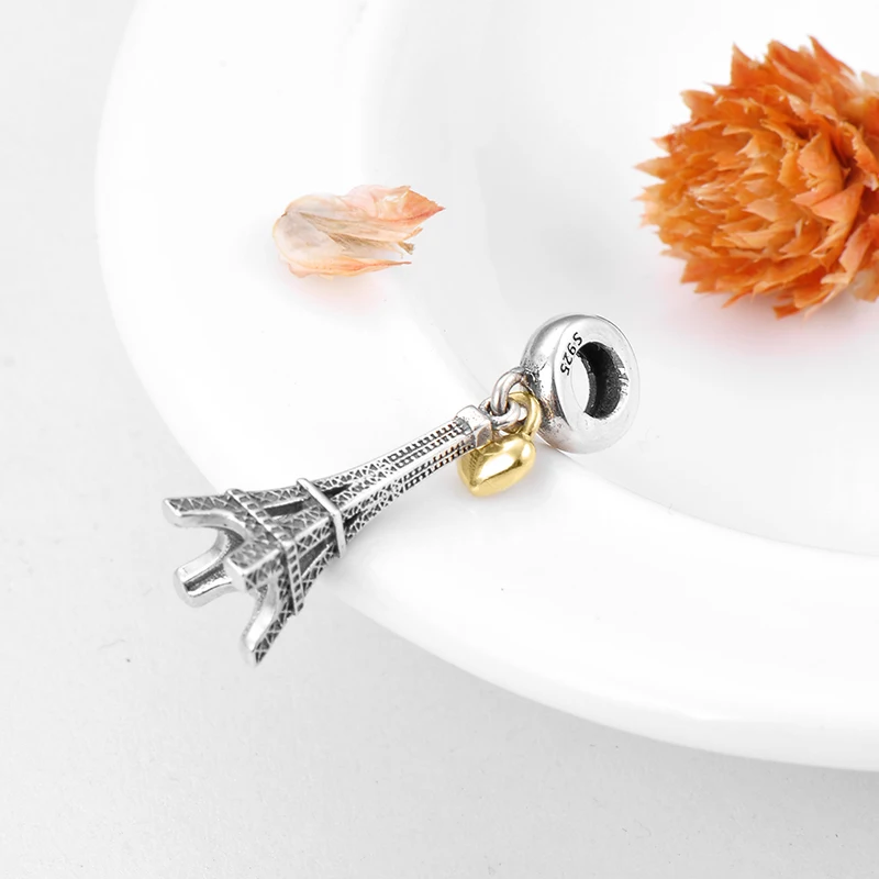 Подвеска в виде Эйфелевой башни с золотым сердцем серебро 925 пробы | Украшения и