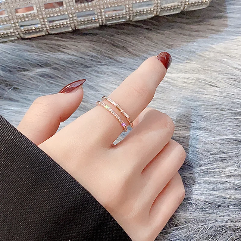 

Женское кольцо из розового золота, с двойным бантом