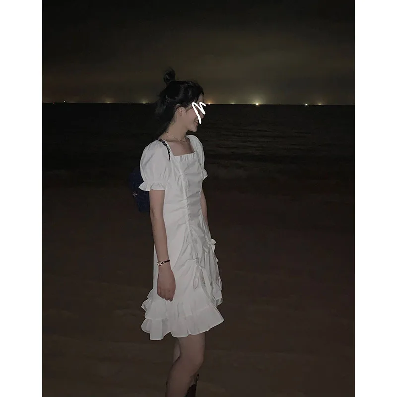 

Korean version of the lightly cooked island holiday white dress 2021 new spring style ruffle skirt tide
