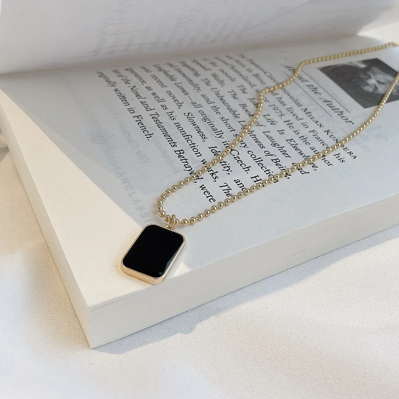 

European and American personality wild black square brand necklace retro style net red pendant light luxury sweater chain