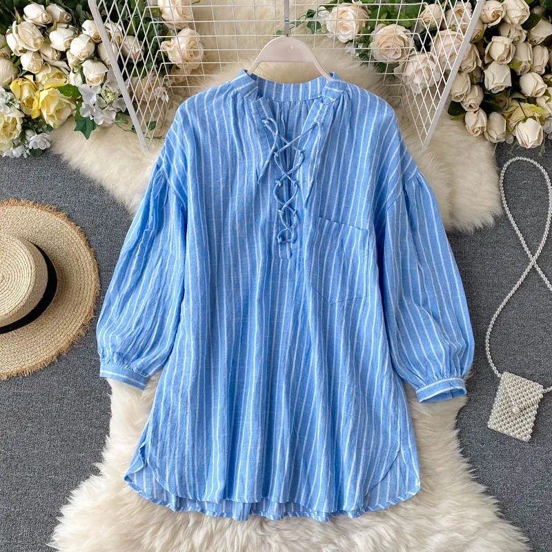 Женская блузка в полоску с перекрестными завязками V-образным вырезом и