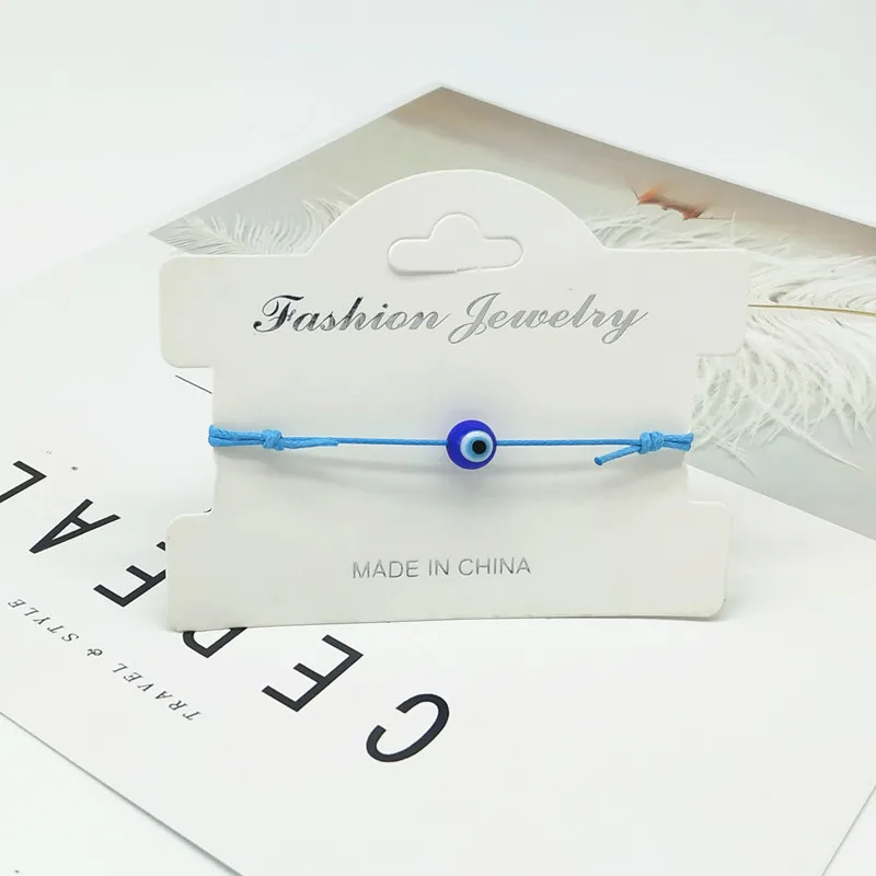 Женский и мужской браслет модный тонкий плетеный с черной нитью сглаза