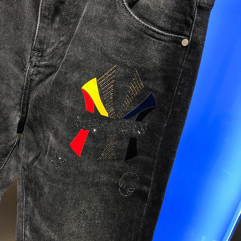 

2020 men's jeans autumn and winter new trend youth letter embroidery hot drill three dimensional cutting small leg pants