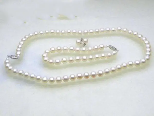 

Genuine 6.5-7mm AAA+ grade perfect round white akoya pearls SET 14K/20 solid gold