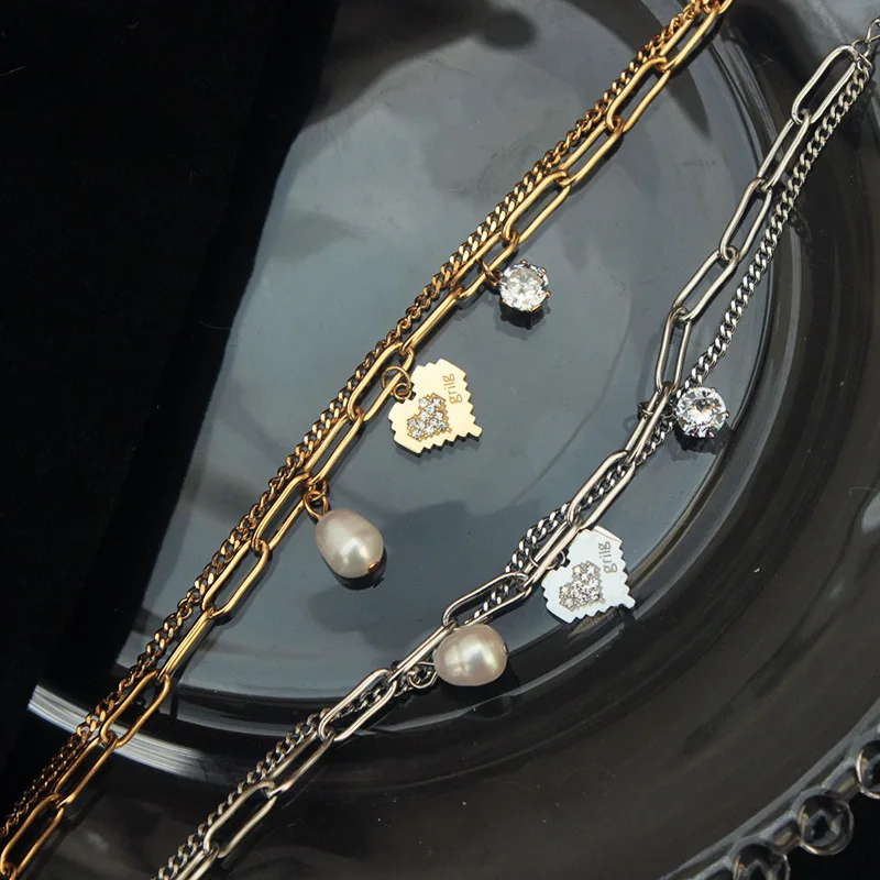 

Mosaic love double chain high quality strong color protection diamond inlaid personalized bracelet pearl titanium steel bracelet