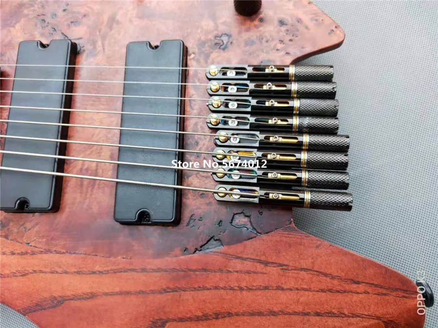 

High quality 8-string headless electric guitar with camphor wood fingerboard can be customized free shipping