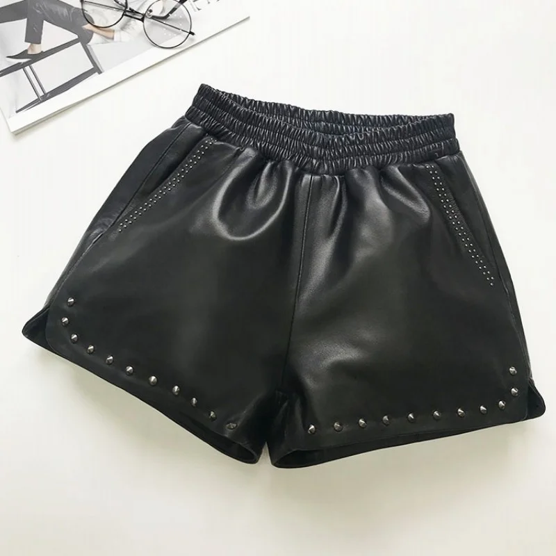 

You'll see classic women leather shorts elastic rivets high waist loose fitting divided warm pants streetwear sheepskin shorts
