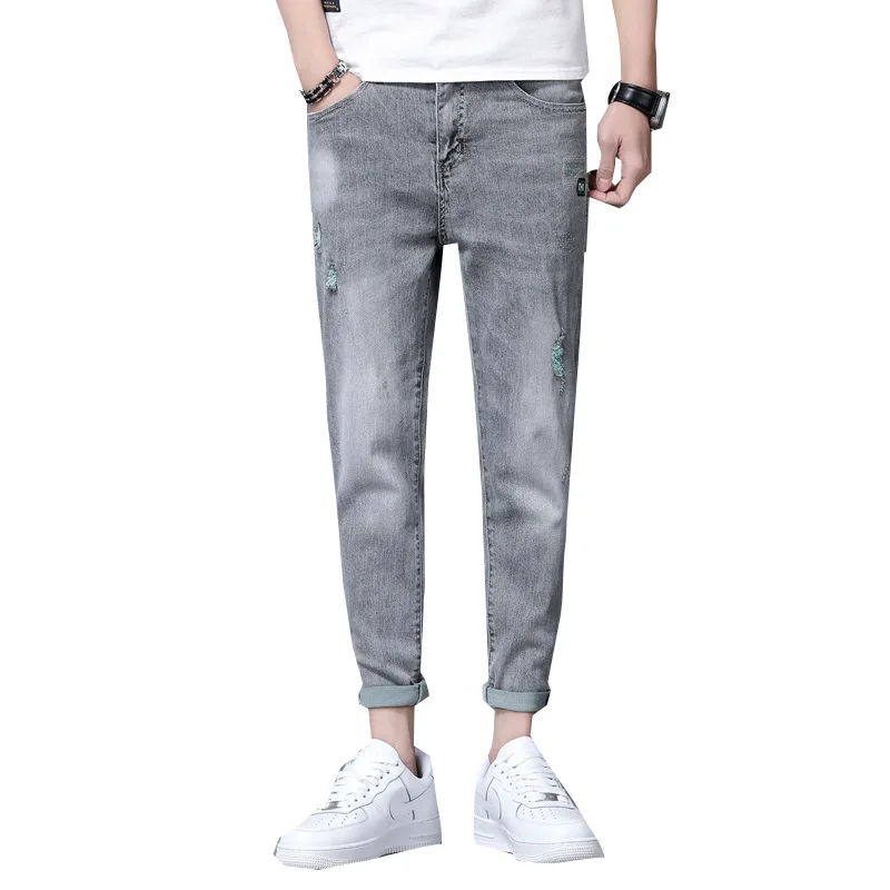 

2021 summer new men's jeans Korean youth casual slim hole stretch jeans men's fashion