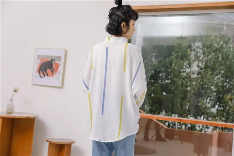 

2021 Korean fashion small fresh lapel contrast color striped top loose hedging long-sleeved shirt women