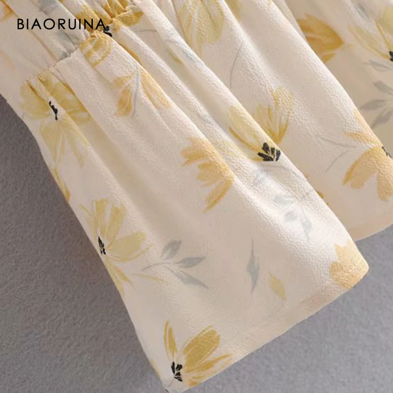 

BIAORUINA Women's Yellow Floral Print Sweet Shirt Short Sleeve Female All-match Single Breasted V-neck Casual Blouse Ruffle Hem