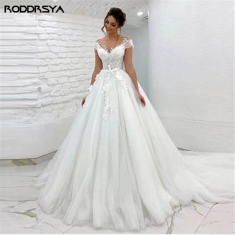 

RODDRSYA Tulle Princess Wedding Dresses Sheer Neck Cap Sleeves Lace Applique With Back Buttons Bridal Gowns 2021 Robe de mariage