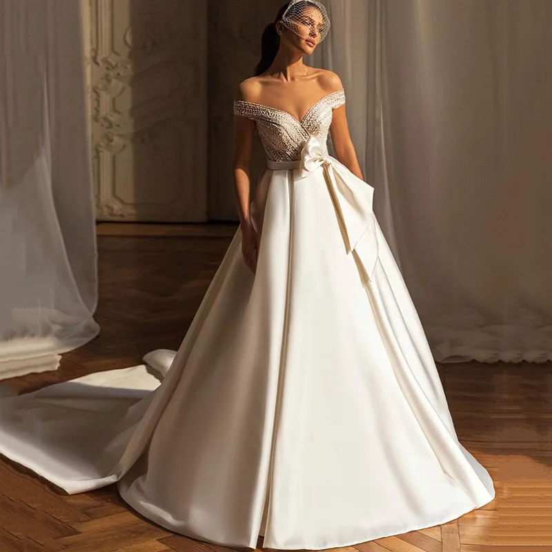 

Haute Couture Satin Wedding Dress Cap Sleeve O Neck Beaded Wedding Gowns Bow Sweep Train Church Bride Dresses 2021