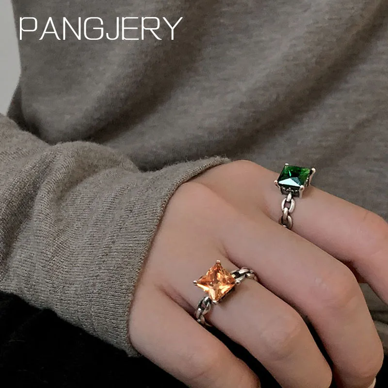 Женский комплект колец из серебра 925 пробы с оранжевым и зеленым Цирконом |