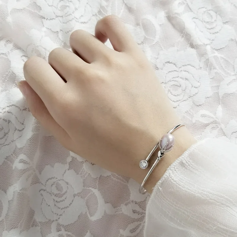 

New European and American fashion personality S925 silver bracelet Inlaid freshwater pearl bracelet factory Silver jewelry 056
