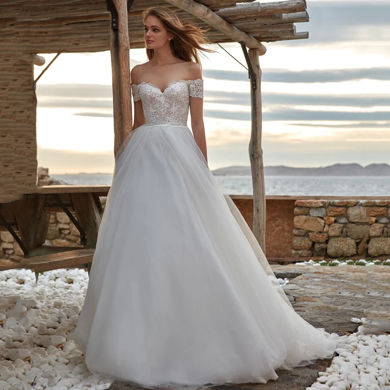 

Eightree Boho Off The Shoulder Wedding Dresses Lace Short Sleeves Bride Dress A-Line Backless Princess Wedding Gowns Custom Made