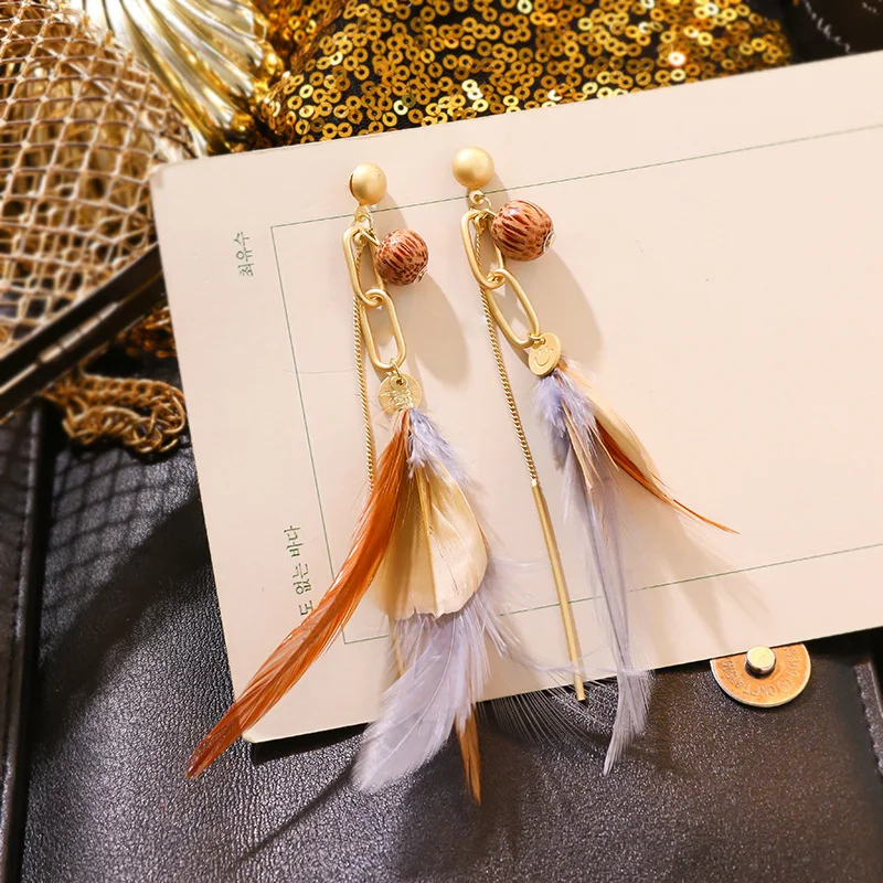 Длинные серьги с бахромой и золотыми перьями в стиле холодного ветра новые