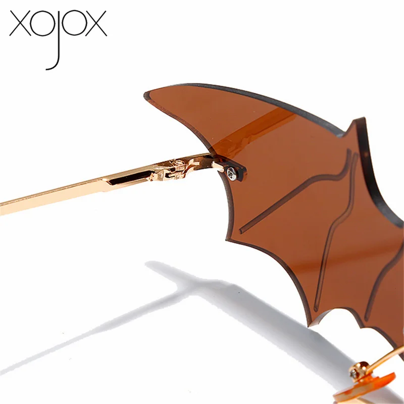 

XojoX Unique Fashion Bat Sunglasses Women Men UV400 Rimless Shape Luxury Brand Glasses Eyewear Bat Frame Party Goggles