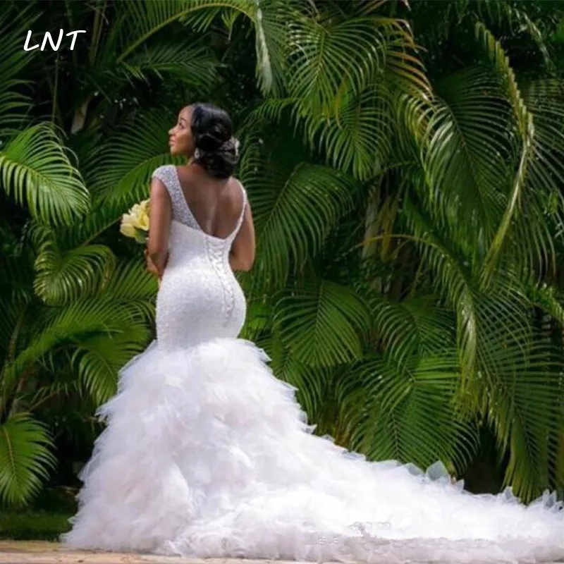 

V Neck Mermaid Plus Size Wedding Dress with Tiered Skirt Beaded Sleeveless Bridal Gown