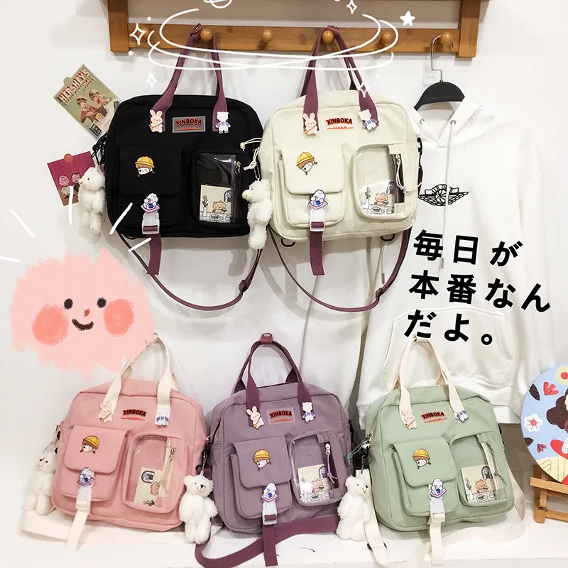 Japanese large-capacity cute bag female Korean version of shoulder messenger bag fashion ins student campus portable book bag
