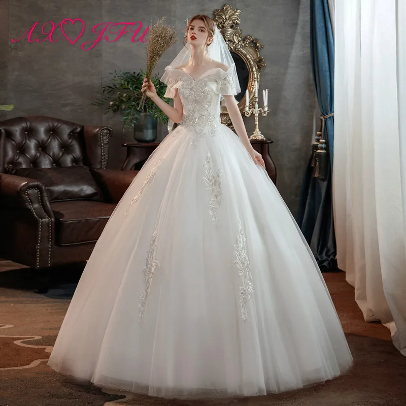 

AXJFU princess flower white lace wedding dress vintage beading crystal boat neck sparkly embroidery ruffles wedding dress