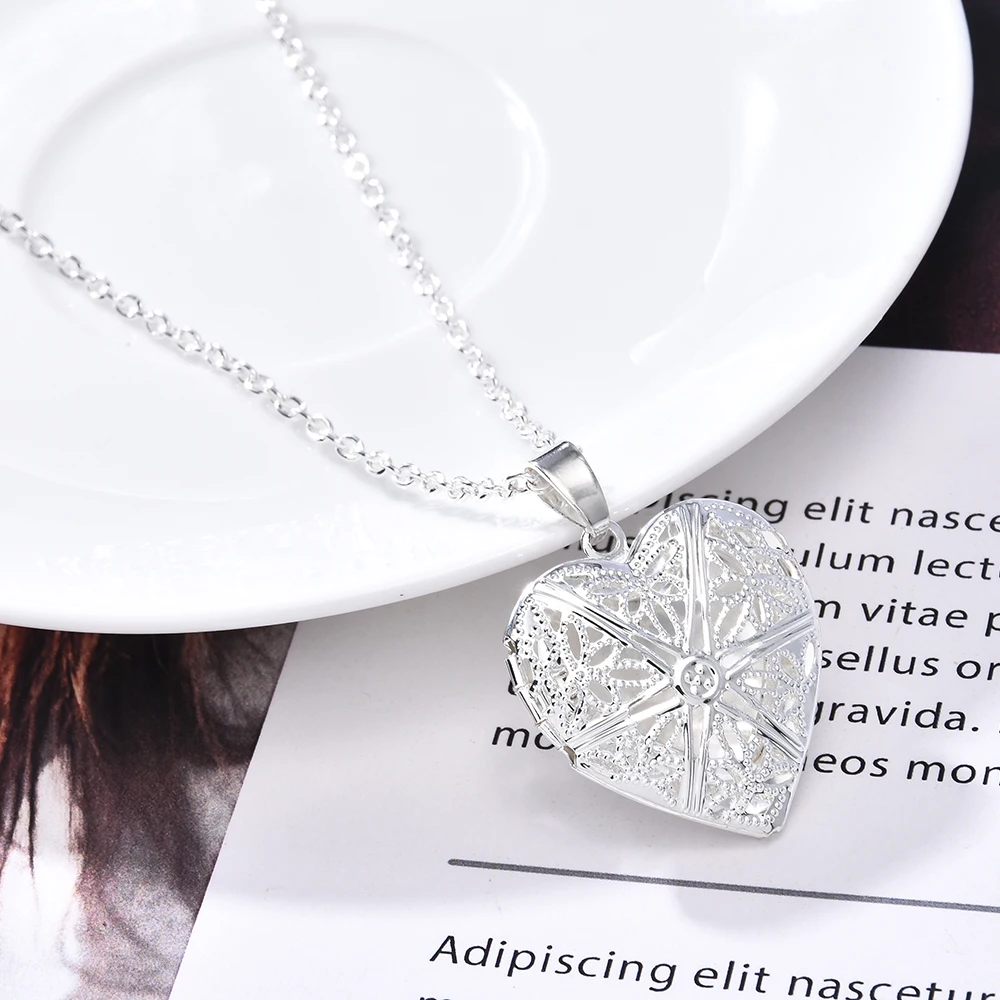 

Photo Inside Fashion Women Hollow Sliver Heart Pendant Long Chain Necklace Sweater Necklace Fashion Necklaces for Women 2020