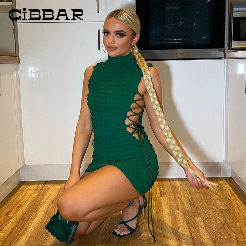

CIBBAR Solid Turtleneck Sleeveless Drawstring Mini Dress Women Stunning Stacked Bandage Retro Sexy Bodycon Dress Party Clubwear